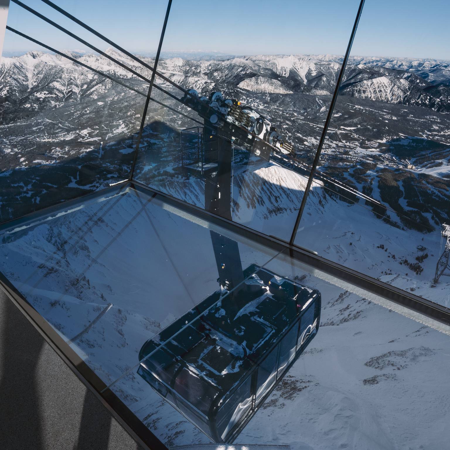 View out of Kircliff with the Lone Peak Tram under the glass floor