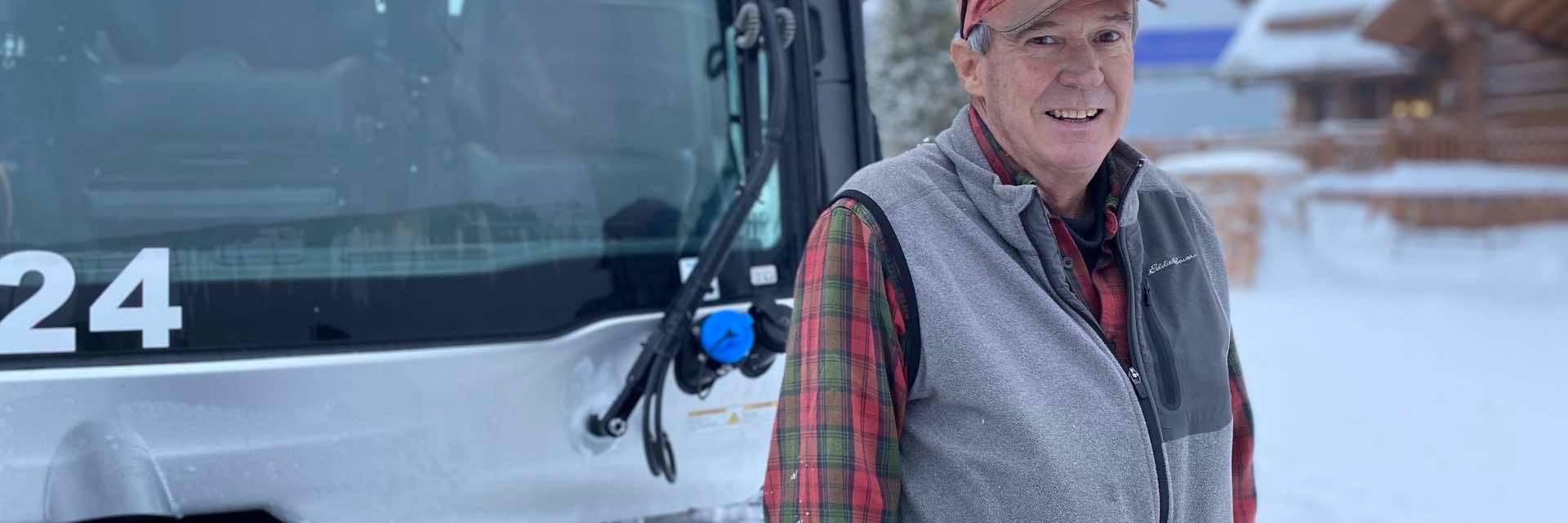 Ed Seth in front of a snowcat