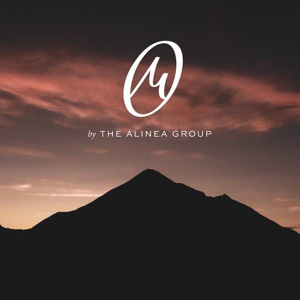 M by The Alinea Group logo over a photo of Lone Mountain