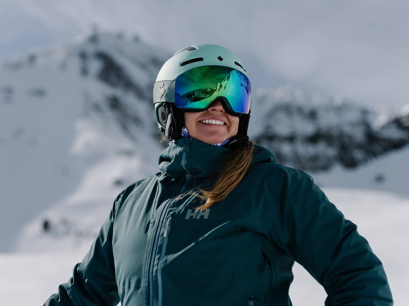 Woman smiling in ski gear