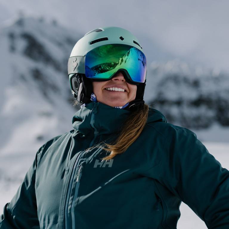 Woman smiling in ski gear