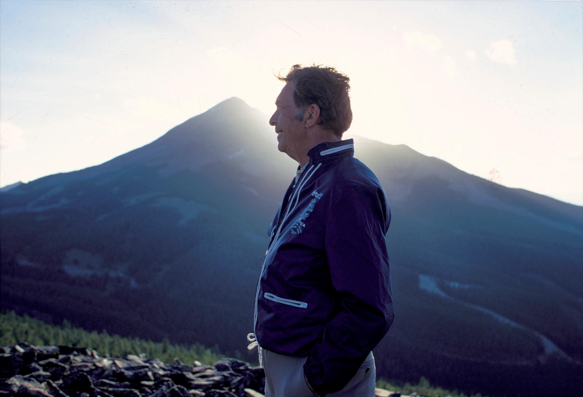 Chet Huntley in front of Lone Mountain