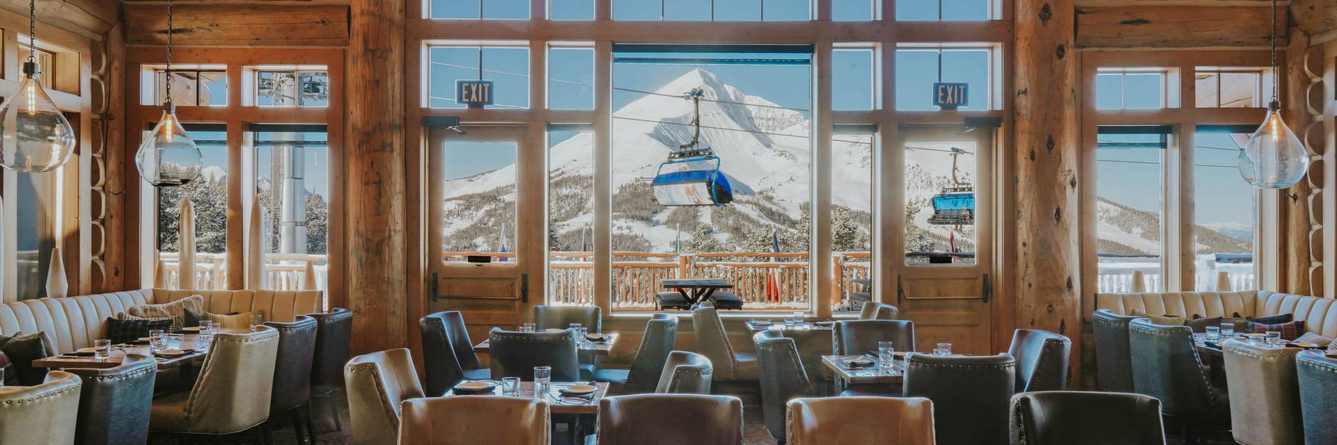 Group of skiers with food and drinks on Vista Deck
