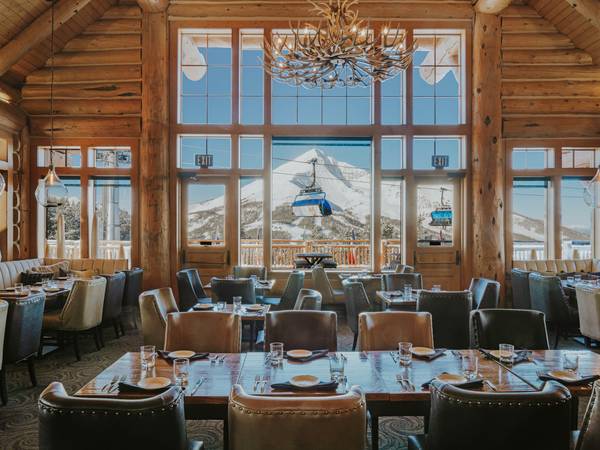 Group of skiers with food and drinks on Vista Deck