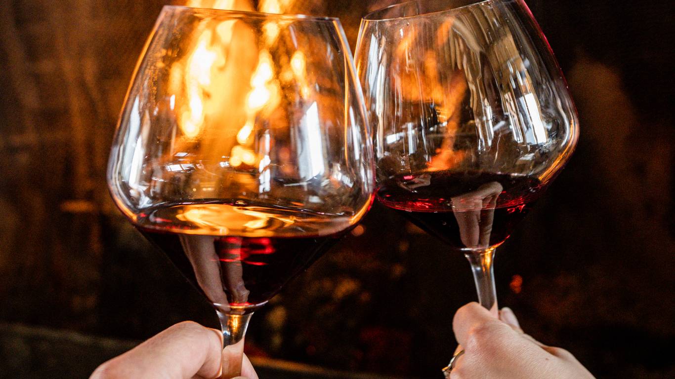 Woman pouring a glass of wine