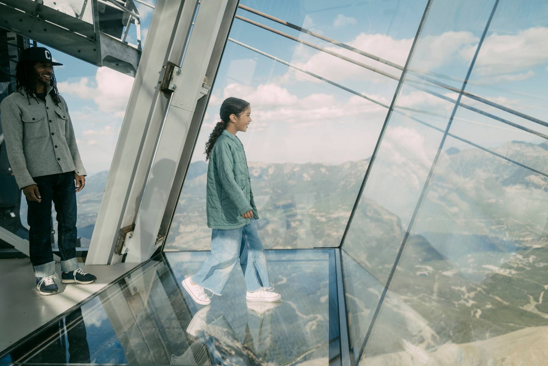 Girl walking out over the glass floor at Kircliff