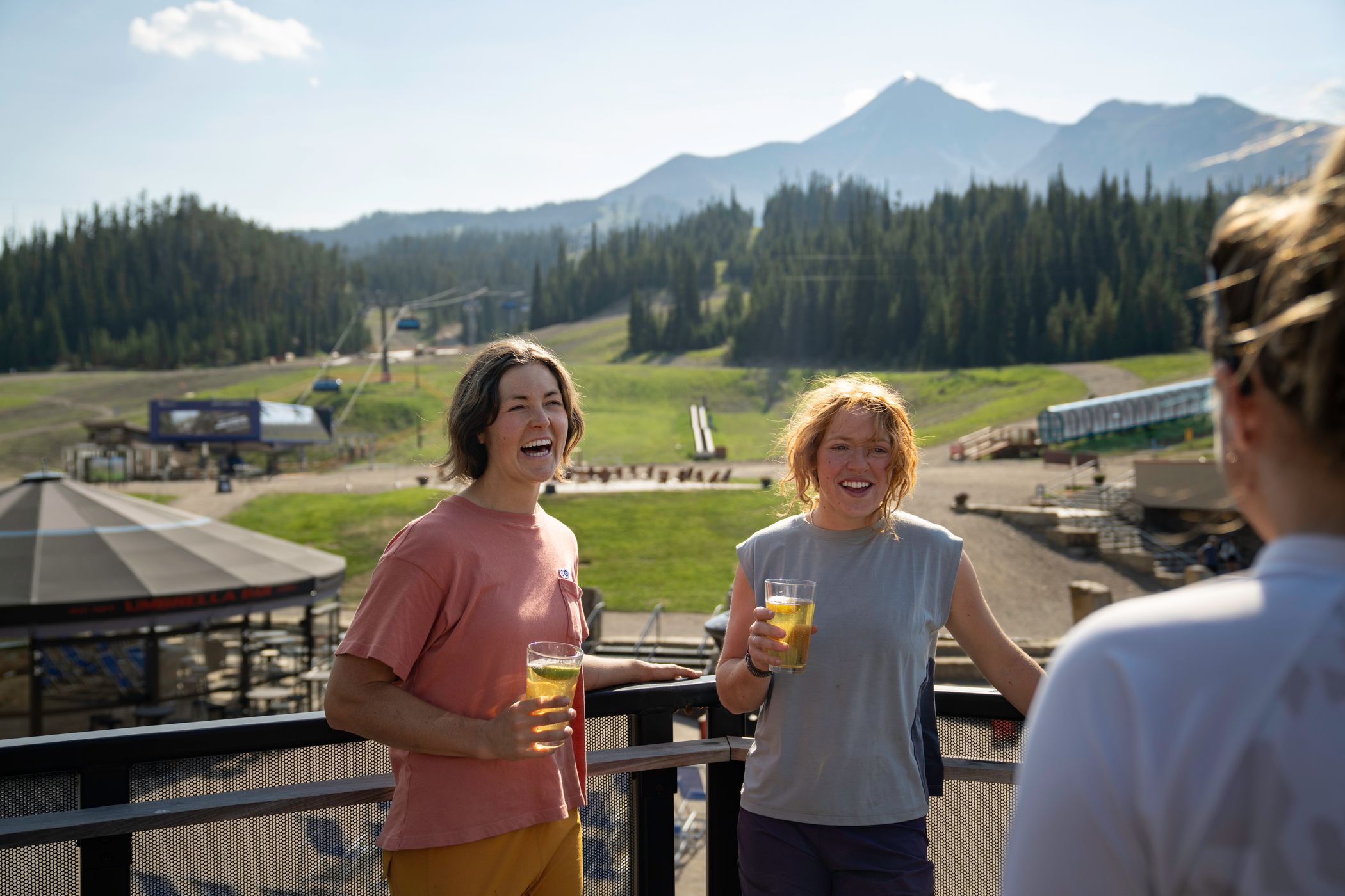 People cheersing with drinks on the Vista Deck