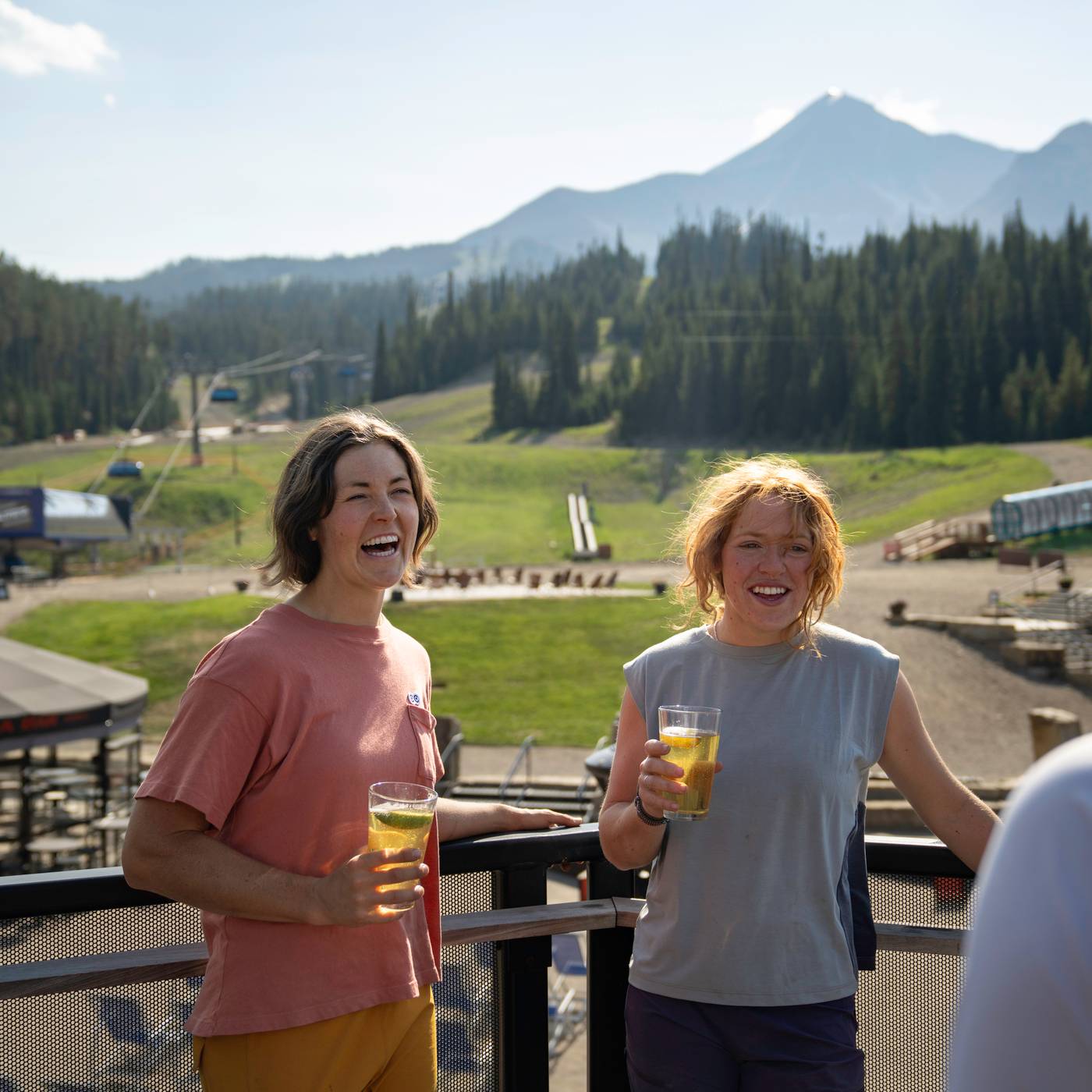 People cheersing with drinks on the Vista Deck