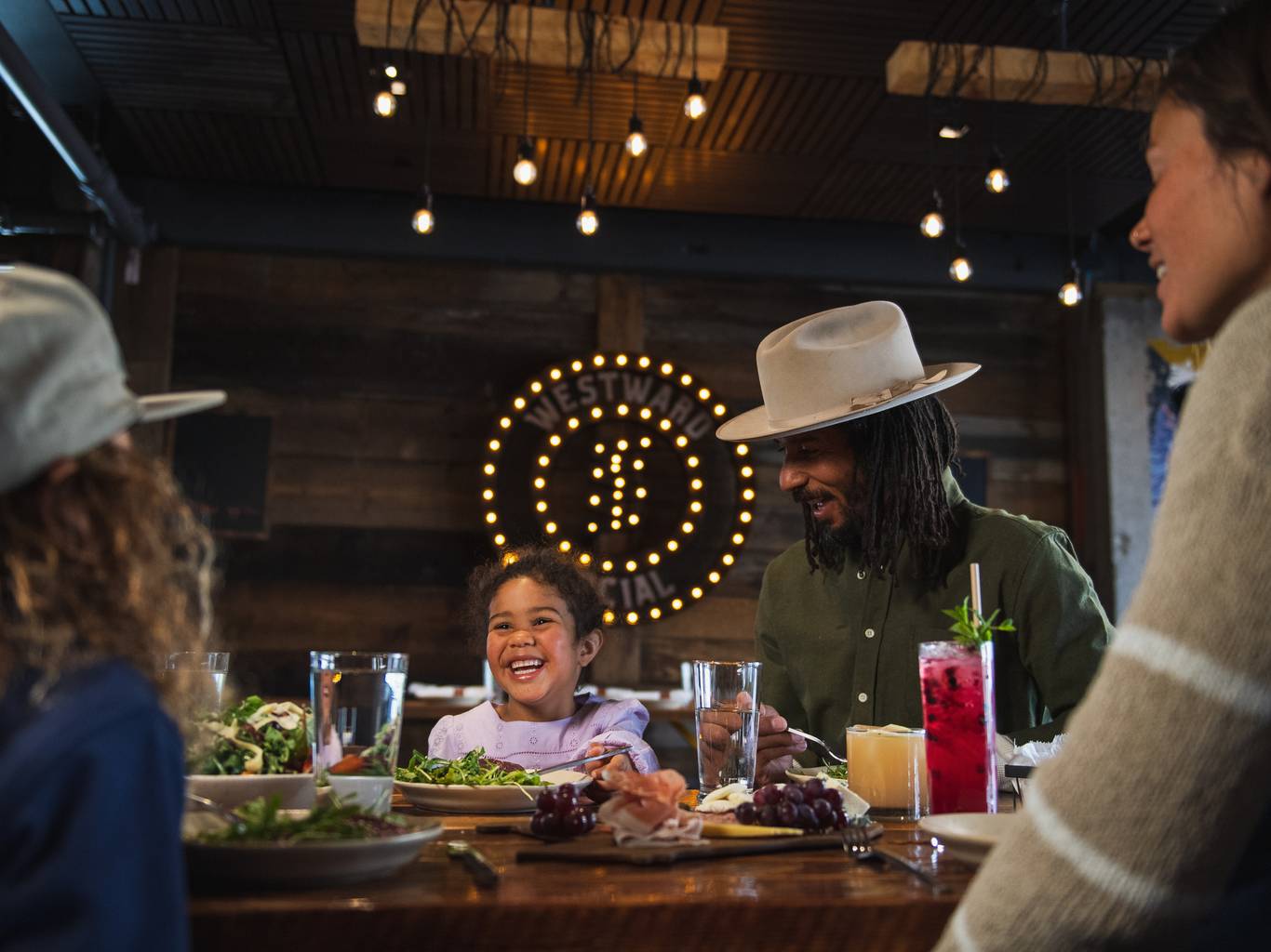 Family with food in Westward Social