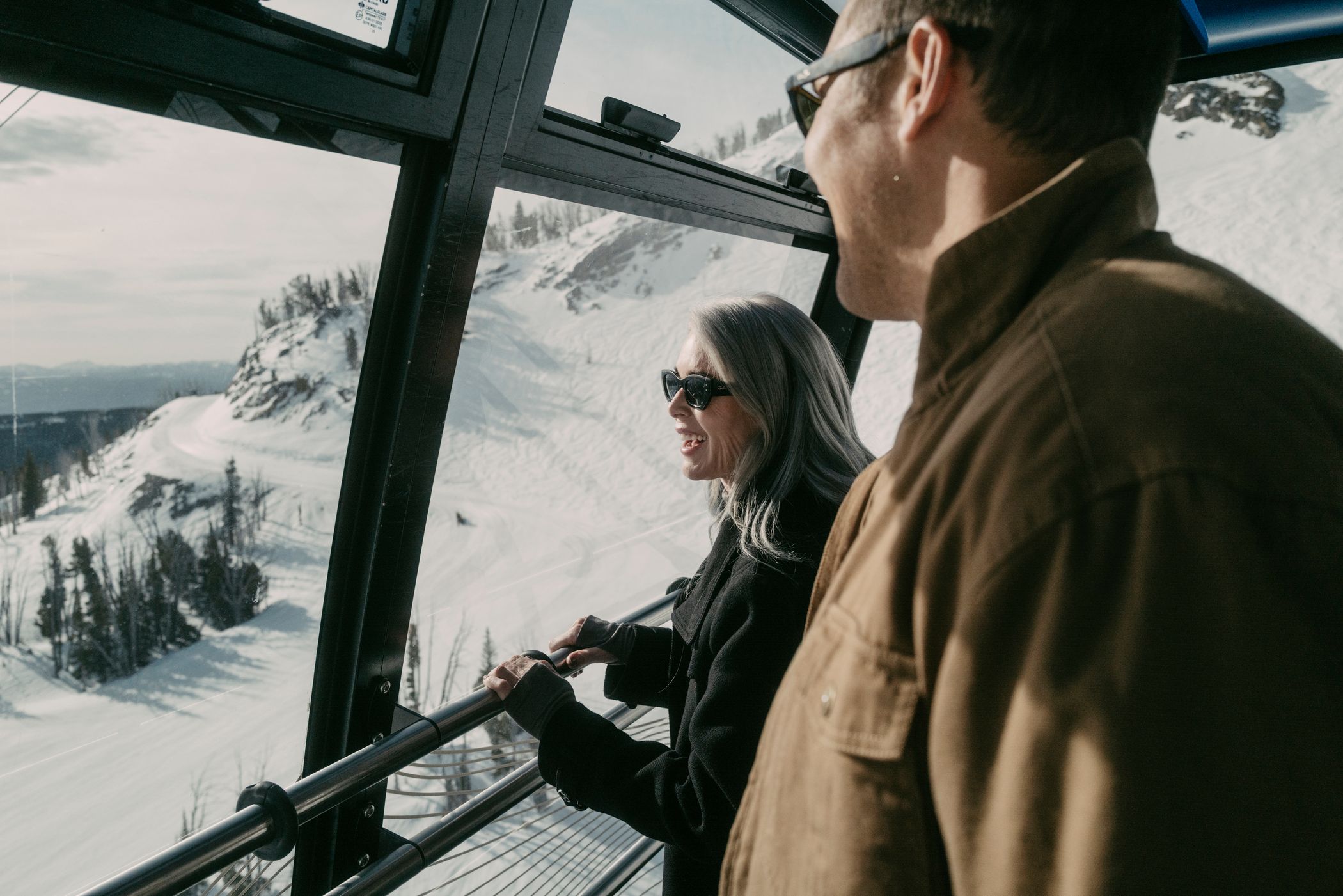 Couple in the Lone Peak Tram in winter