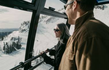 Couple in the Lone Peak Tram in winter