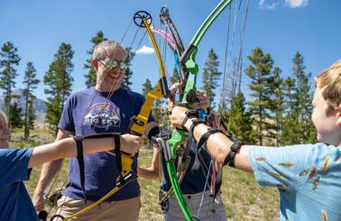 Family with archery bows