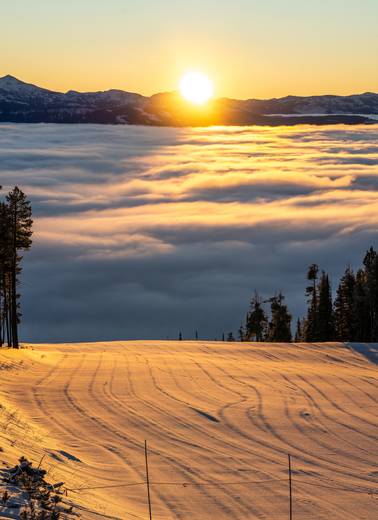 Sunrise on a freshly groomed ski run