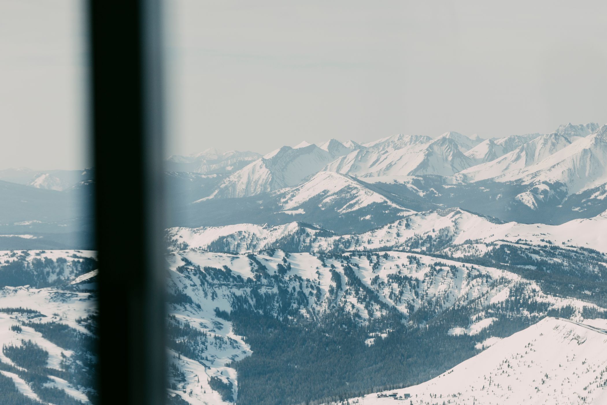 The mountains surrounding Big Sky in winter