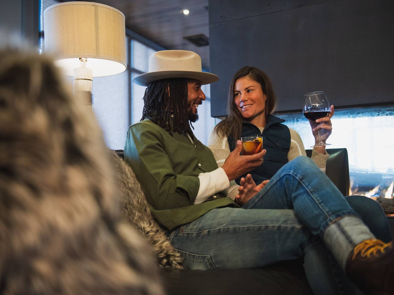 Couple with drinks at the Carabiner Lounge