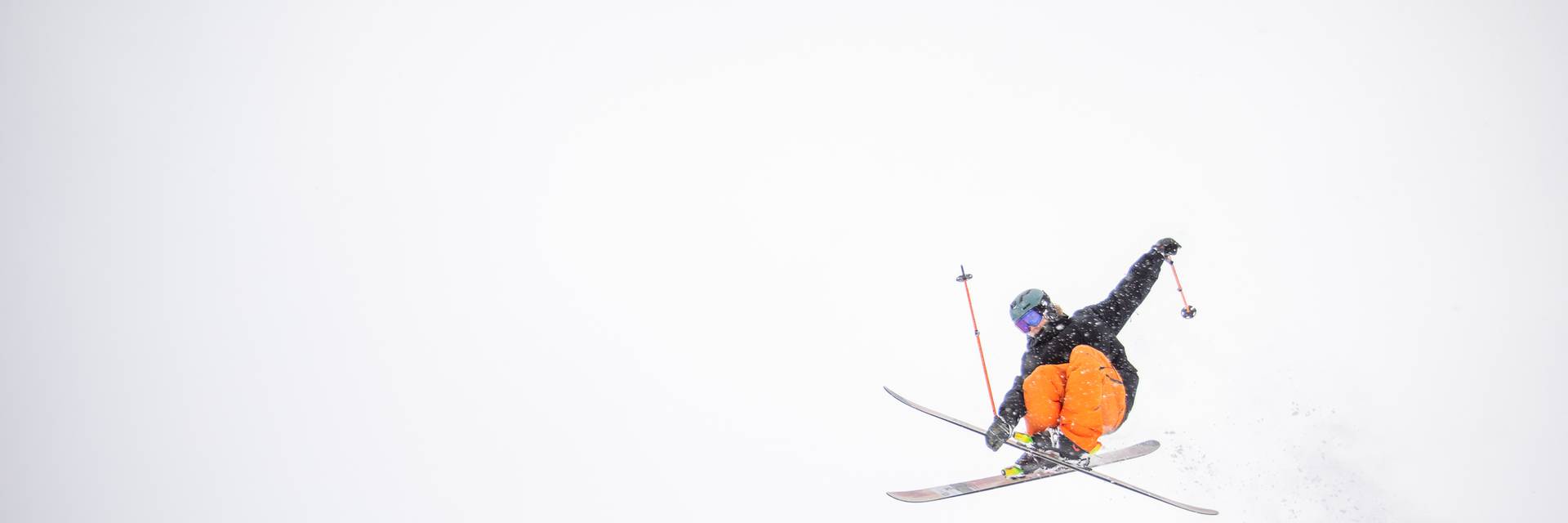 Freeride skier jumpingin powder