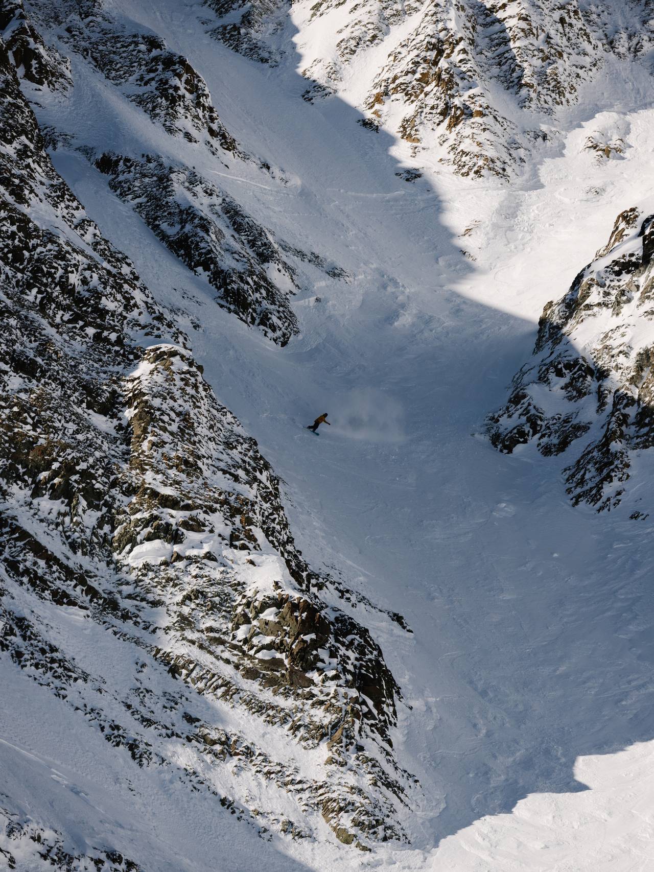 Snowboarder in the Big Couloir at Big Sky Resort