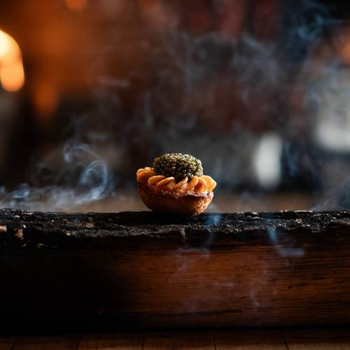 Food on a charred log