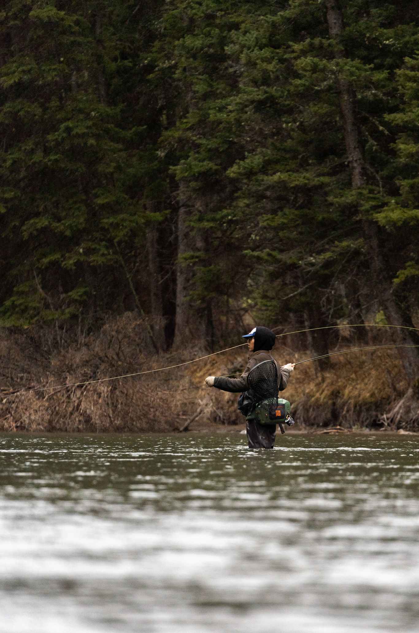 Fly fisher on the Gallatin River in Big Sky Montana