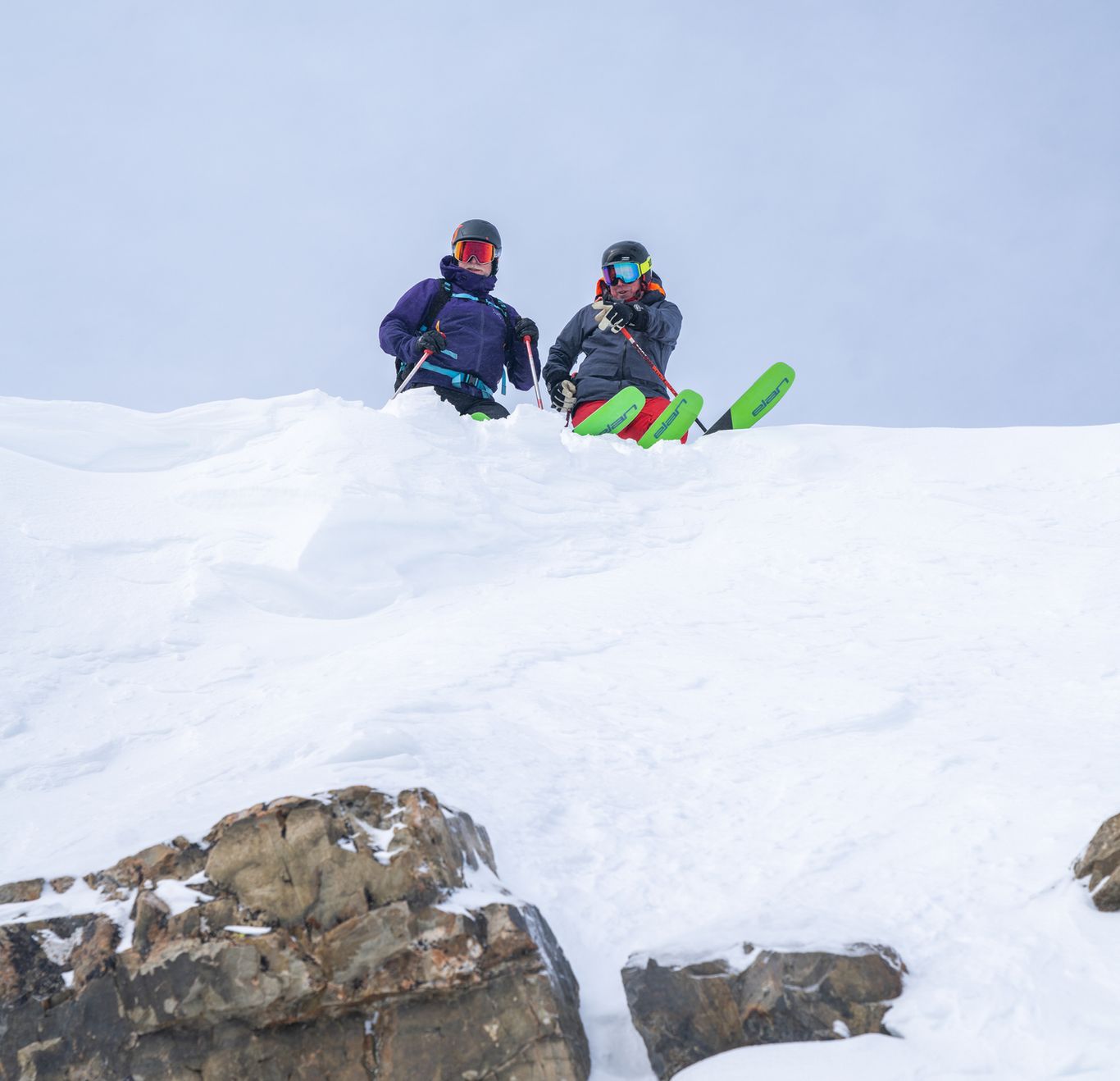 Dan Egan with a student in a ski lesson