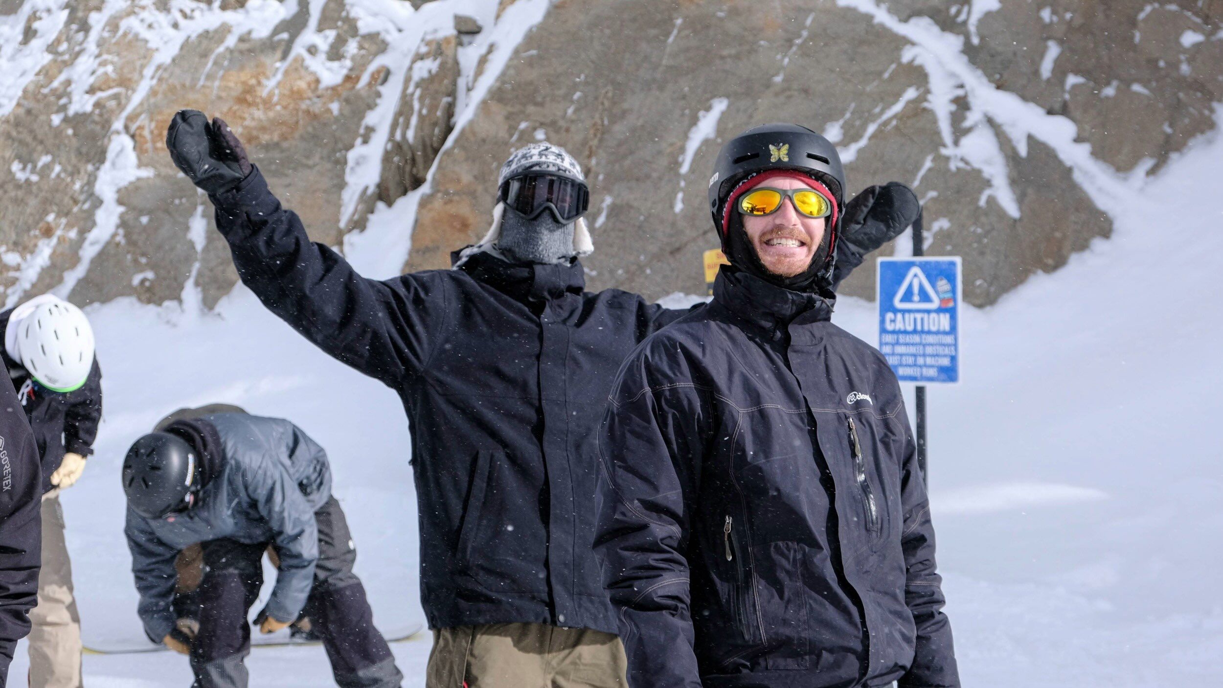 Friends at the top of Great Western in the winter time at Brighton Ski Resort