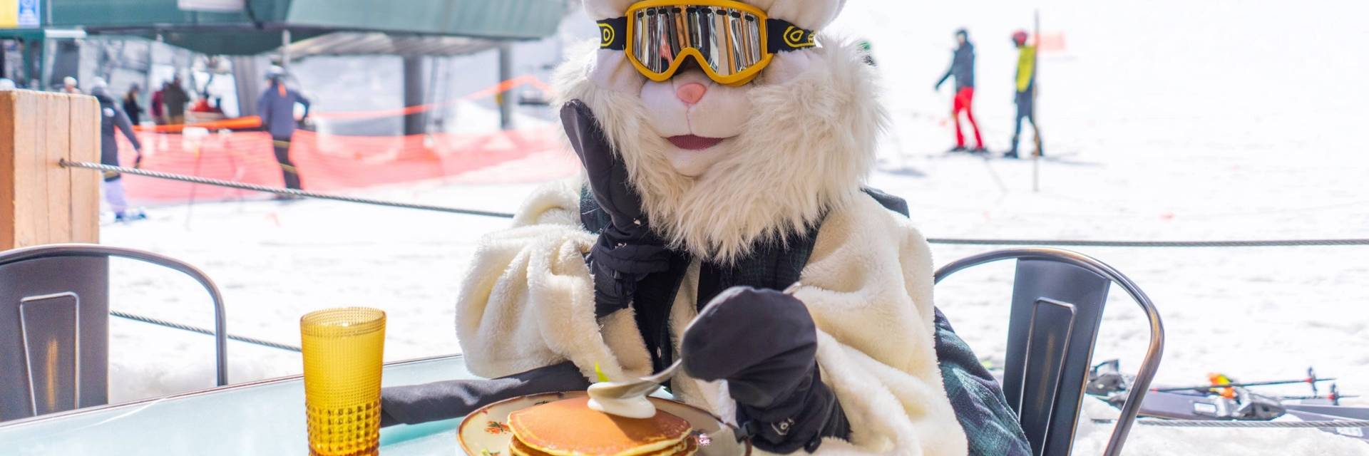 Easter bunny eating a pancake breakfast