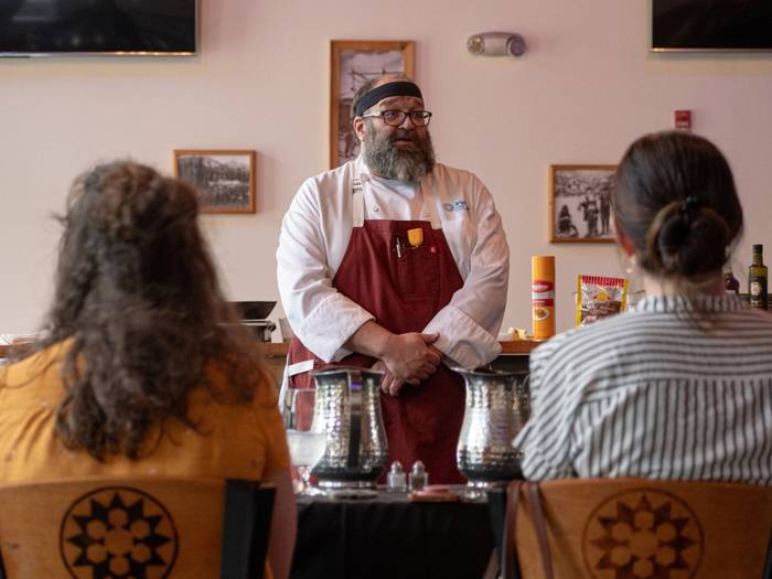 Chef Jeff teaching a cooking class in the summer at Brighton Resort