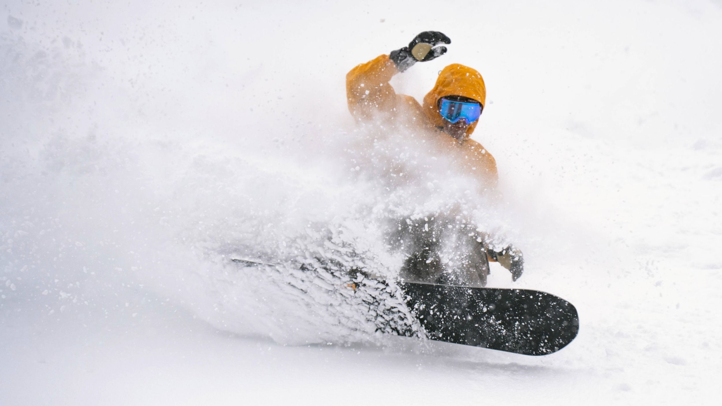 Snowboarder on a powder day at Brighton Resort