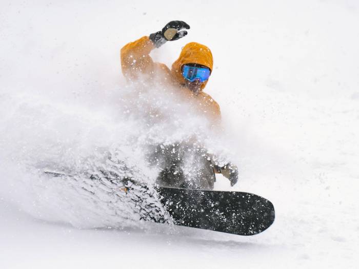 Snowboarder on a powder day at Brighton Resort