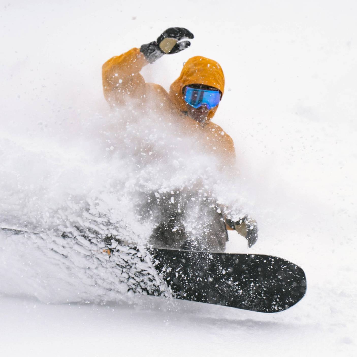 Snowboarder on a powder day at Brighton Ski Resort in Utah