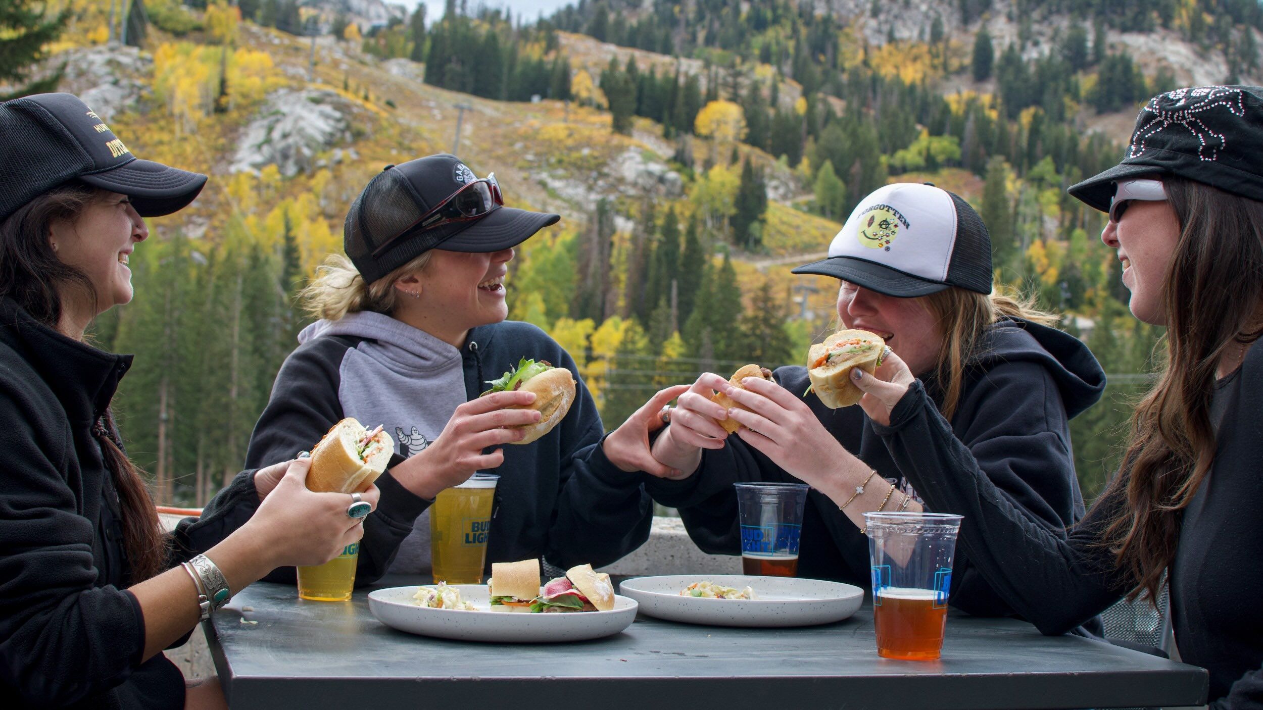 Friends eating together at Not Oktoberfest at Brighton Resort