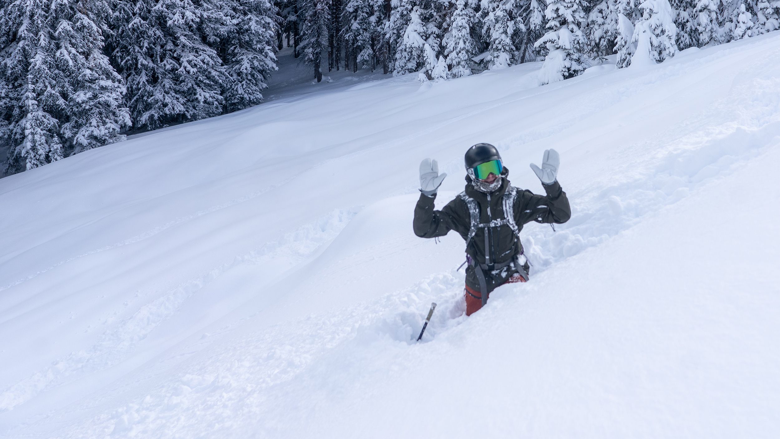 Skiing hip-deep in powder