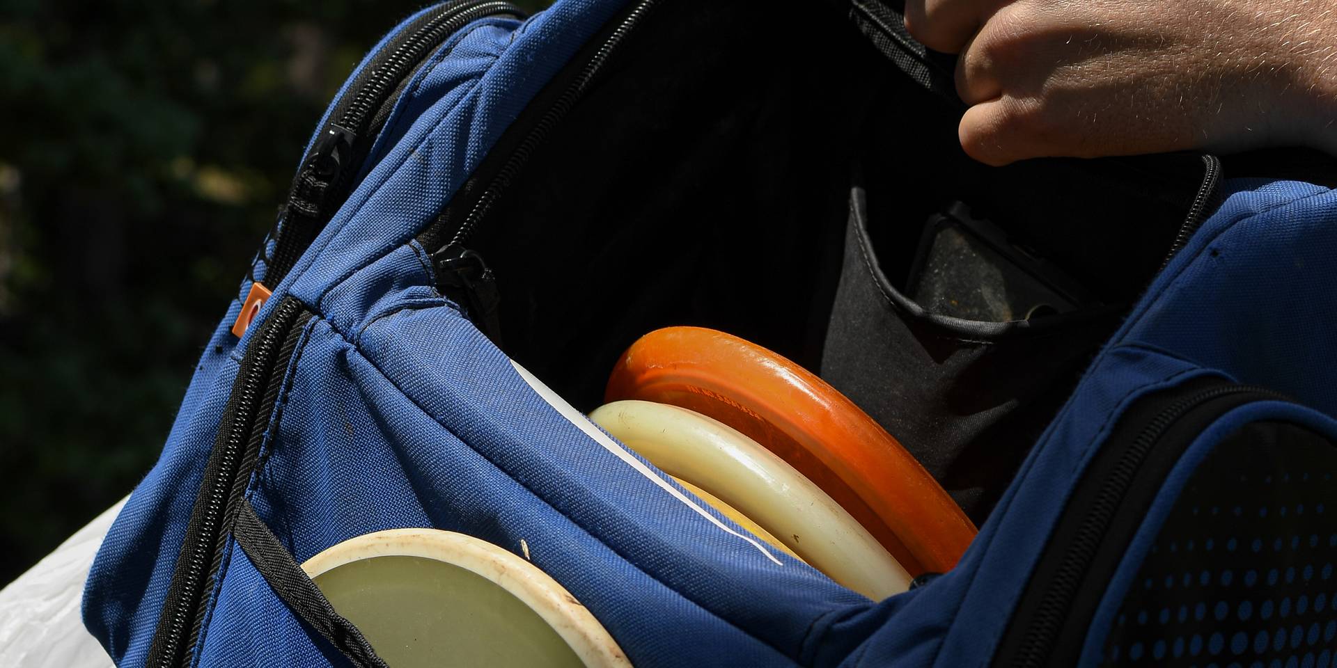 Disc golf bag at Brighton Resort in the summer time