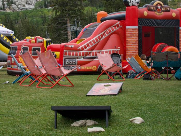 Corn hole game at Brighton Resort in the summer time at Not Oktoberfest