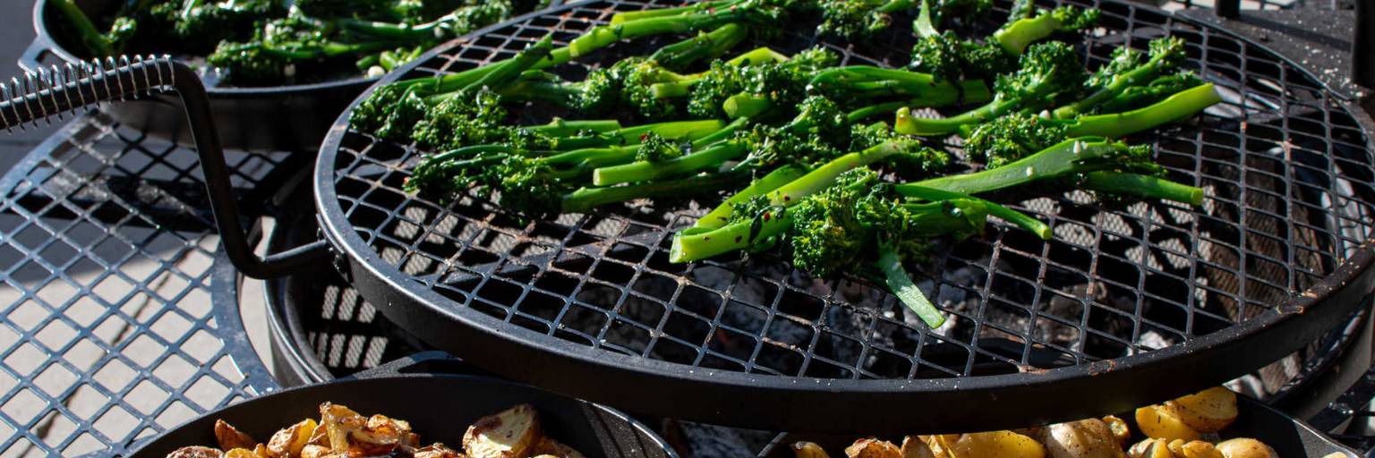 Cooking on the grill at campfire cookouts at Brighton Resort