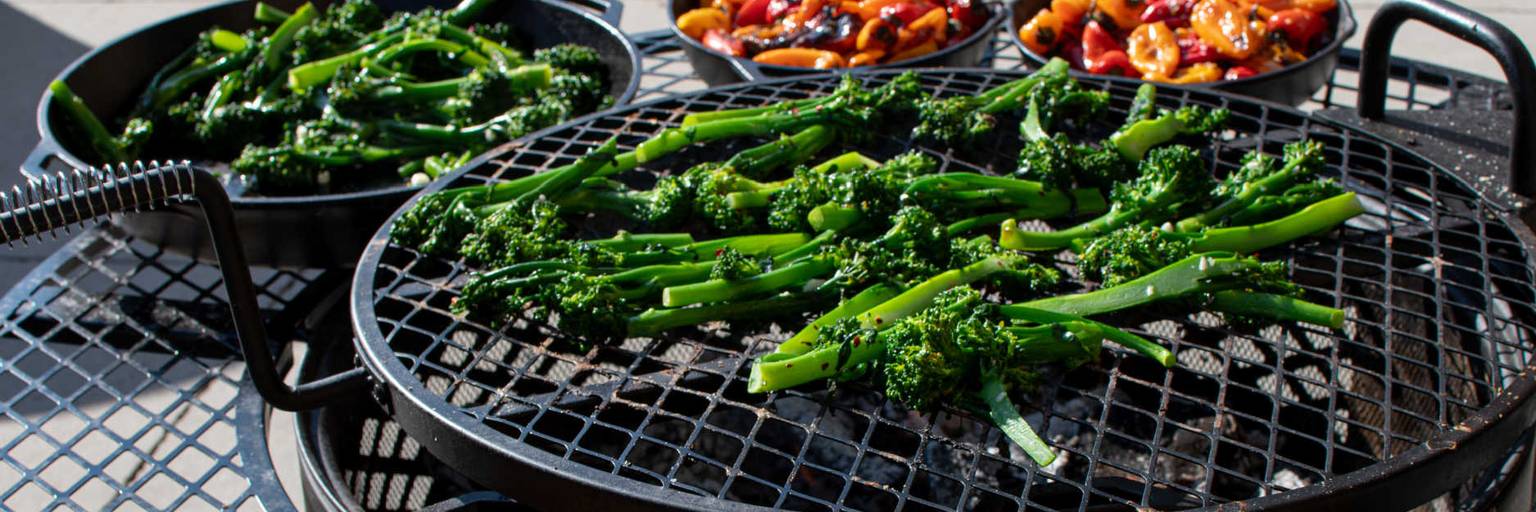 Cooking on the grill at campfire cookouts at Brighton Resort