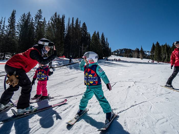 Kid skiers in group lesson at Brighton Resort