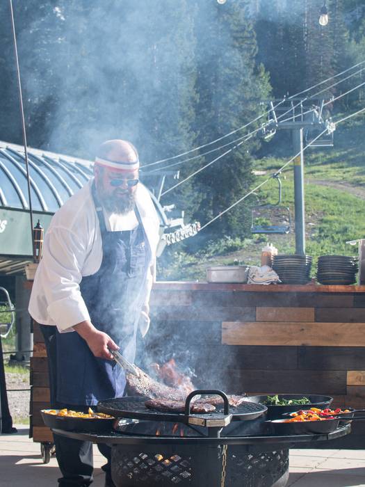 Chef grilling at Brighton Resort in the summer