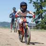 Kid during mountain bike lesson at Brighton Resort in the summer