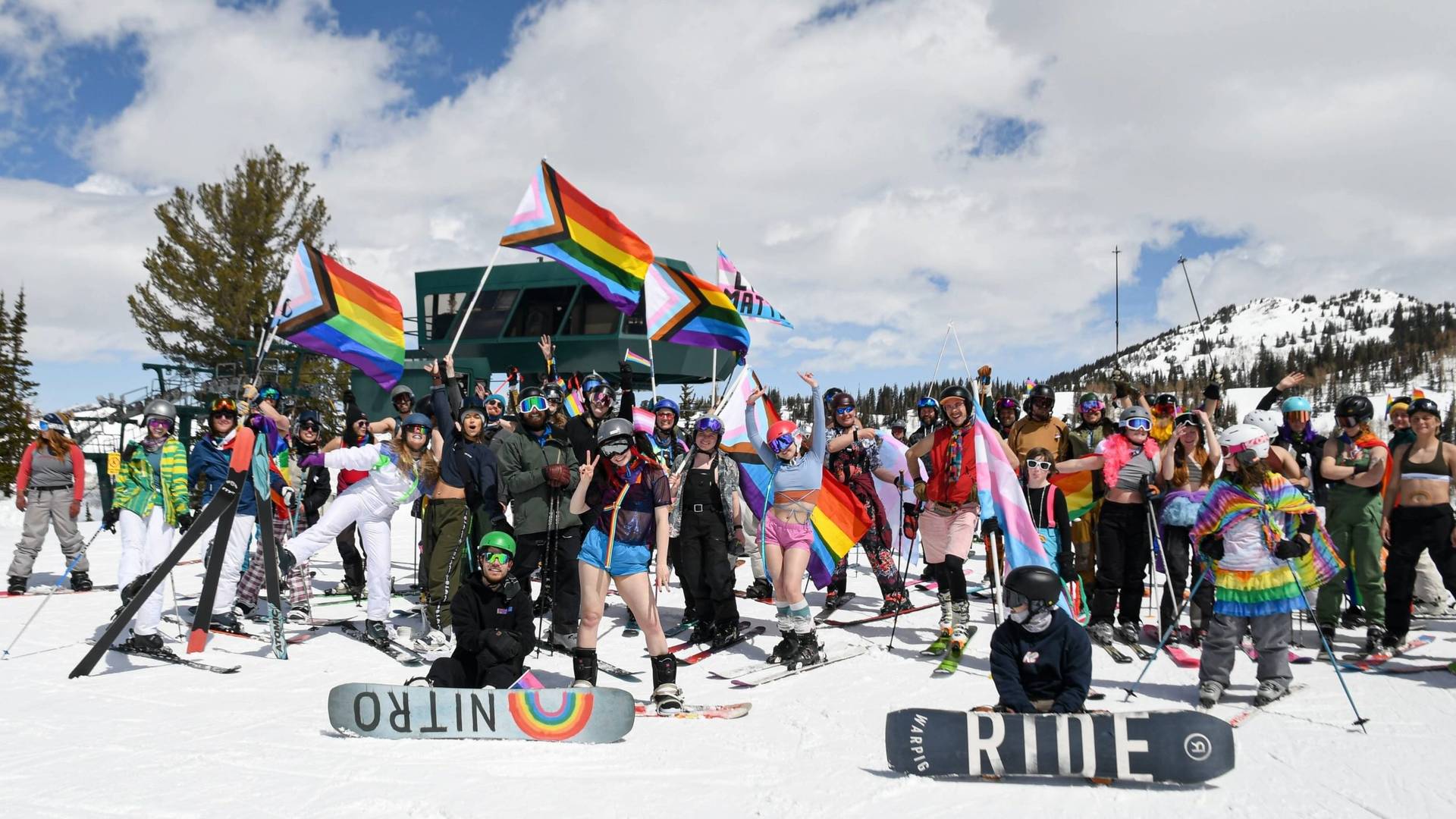 Group photo of Pride Ride at the top of Majestic