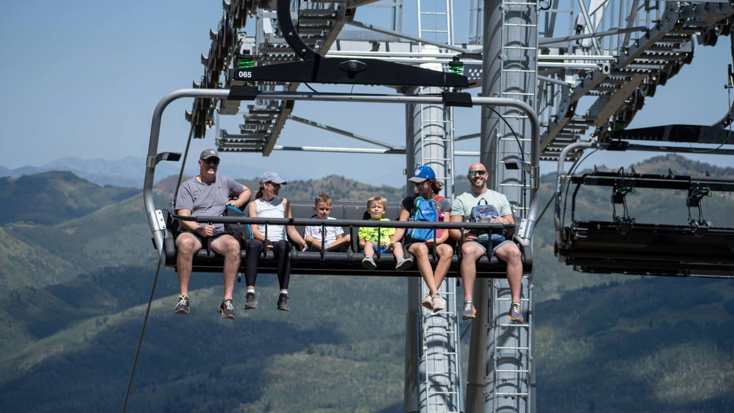 Family and friends on scenic lift ride at Brighton Resort in the summer