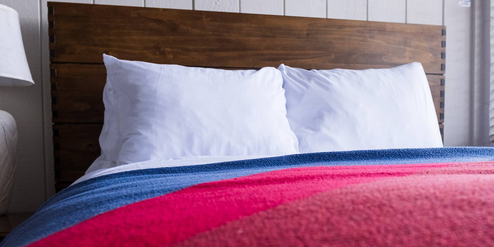 Queen bed in the Brighton Lodge