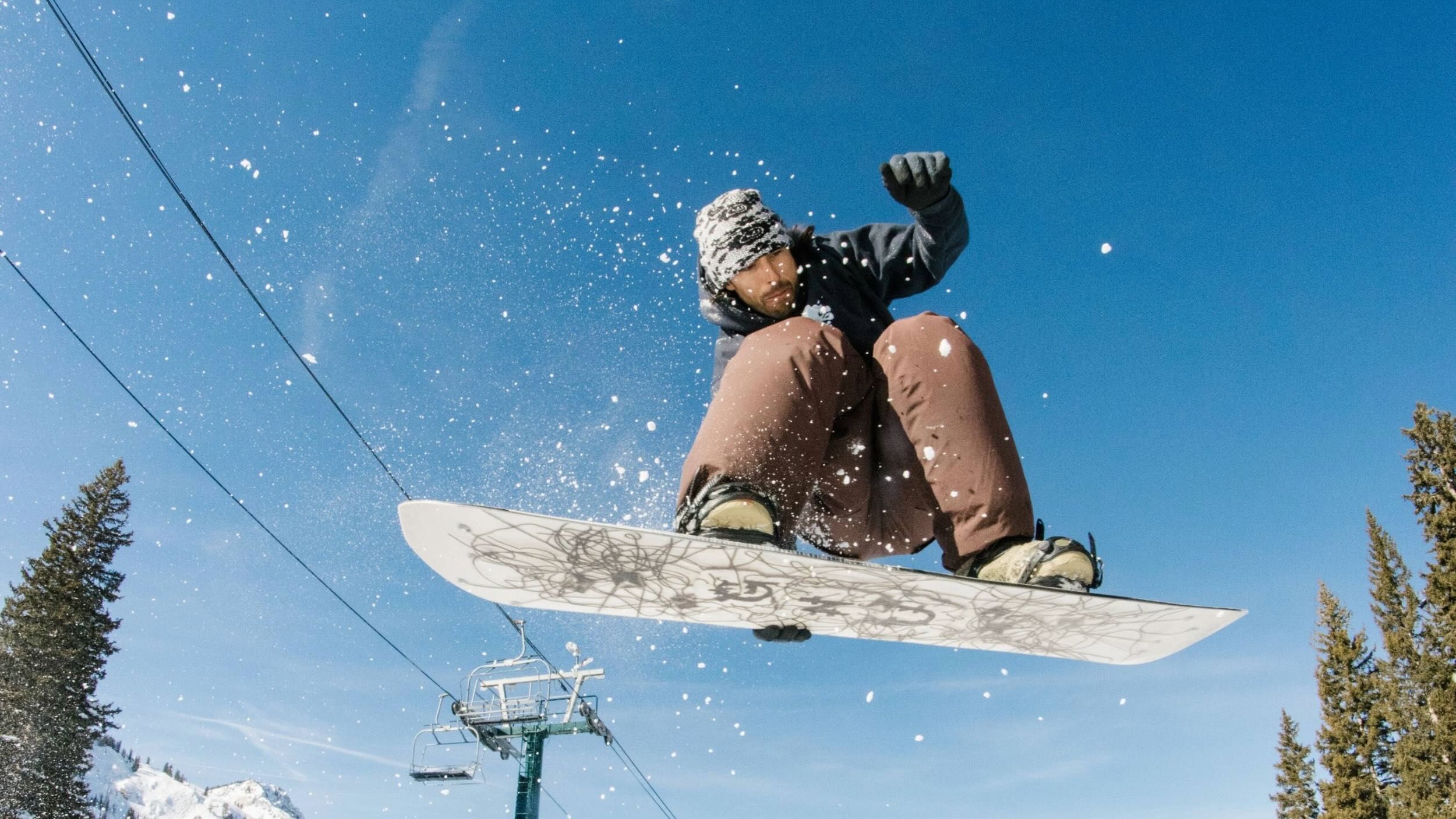 Snowboarder jumping in Brighton terrain park