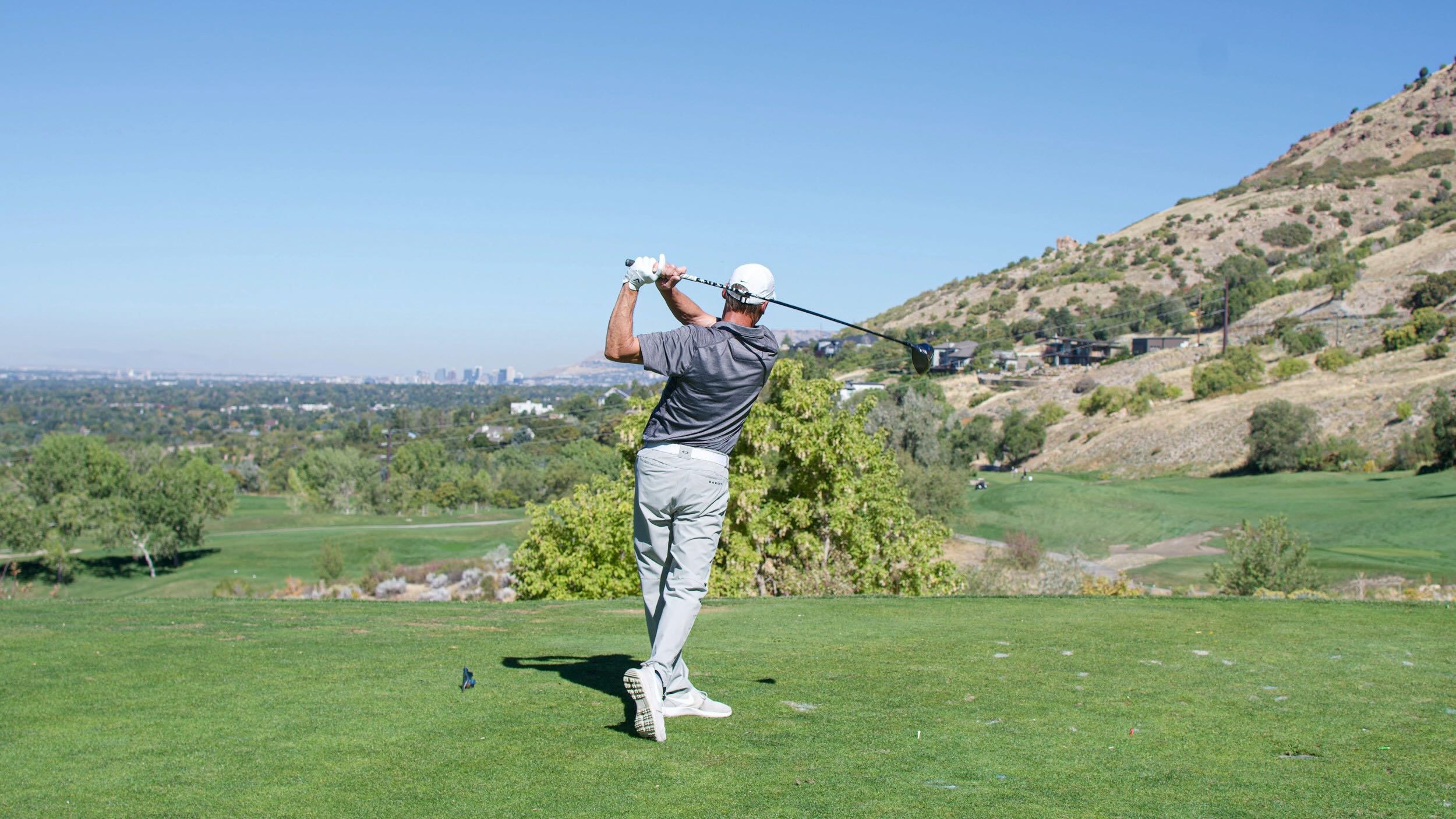 Golfer swing at Brighton Golf Tournament