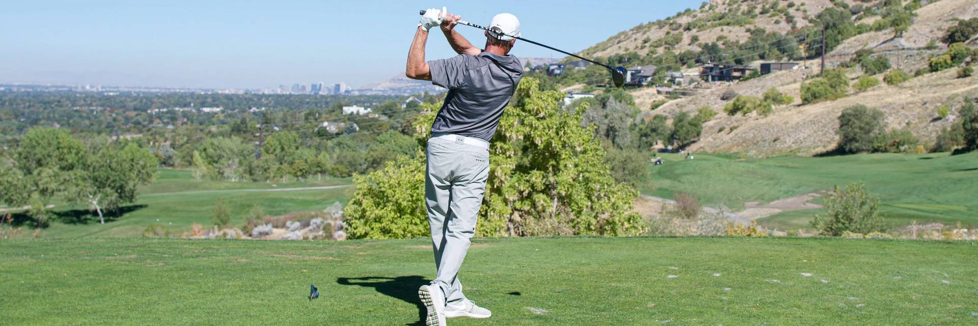 Golfer swing at Brighton Golf Tournament