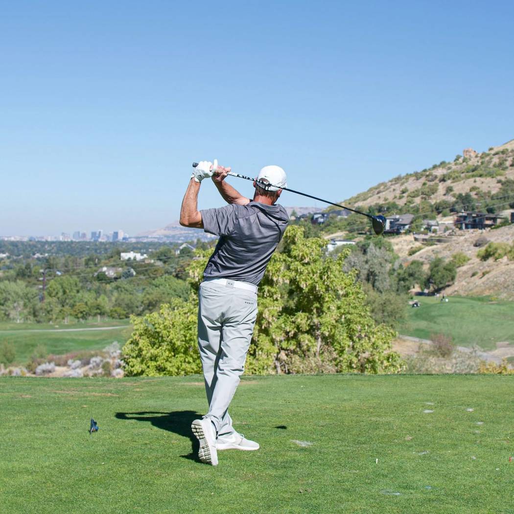 Golfer swing at Brighton Golf Tournament