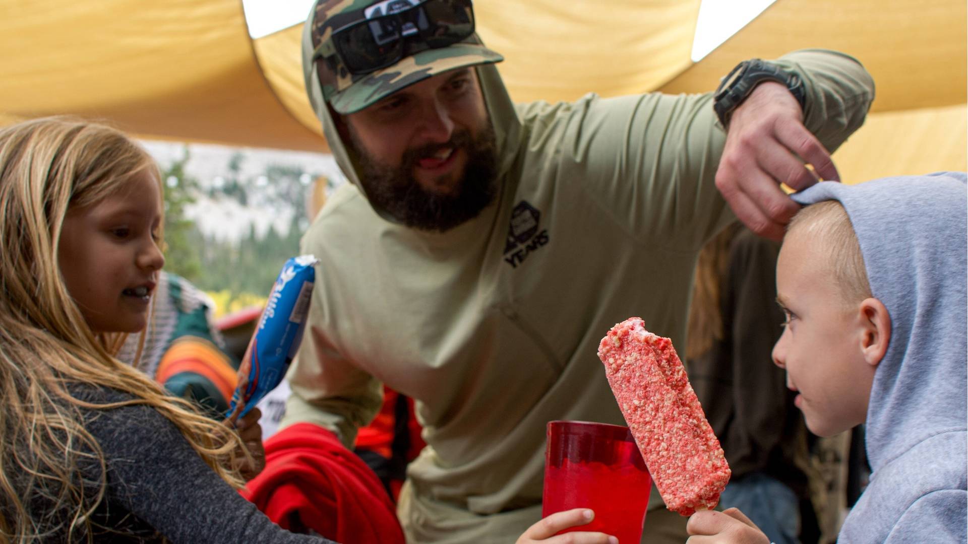 Dad with his kids at Not Oktoberfest at Brighton Resort in the summer time