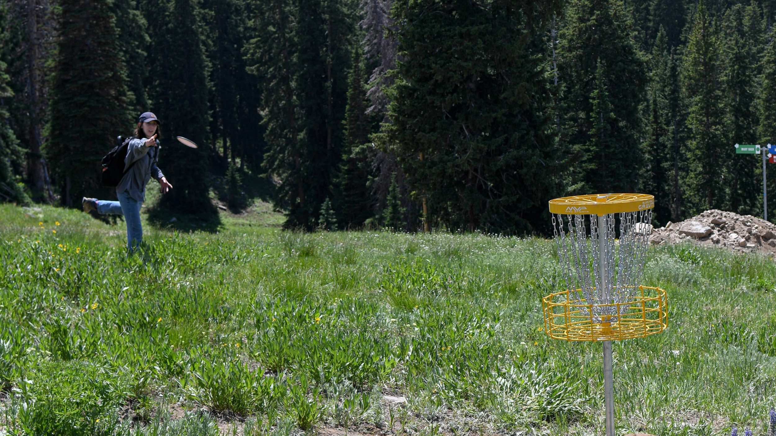 Playing disc golf at Brighton in the summer time