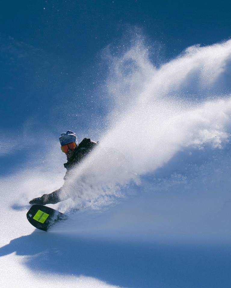 Snowboarder action slash shot