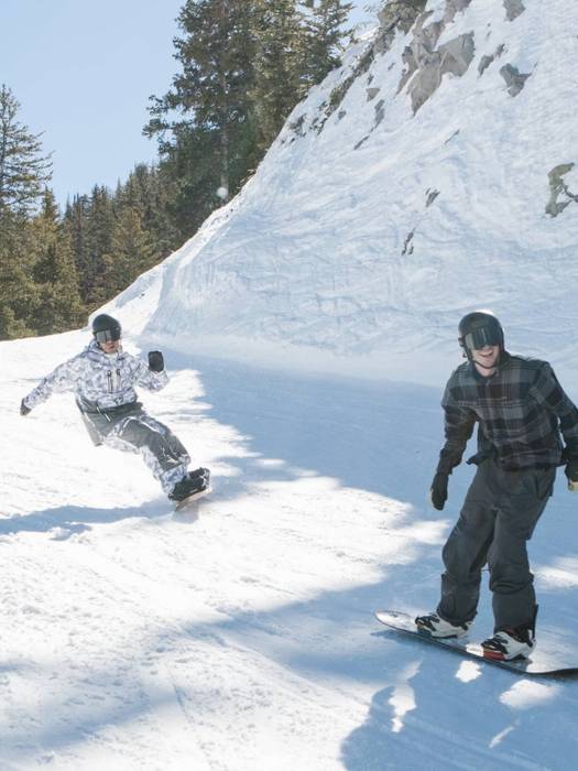 Friends riding together at Brighton Resort in Utah